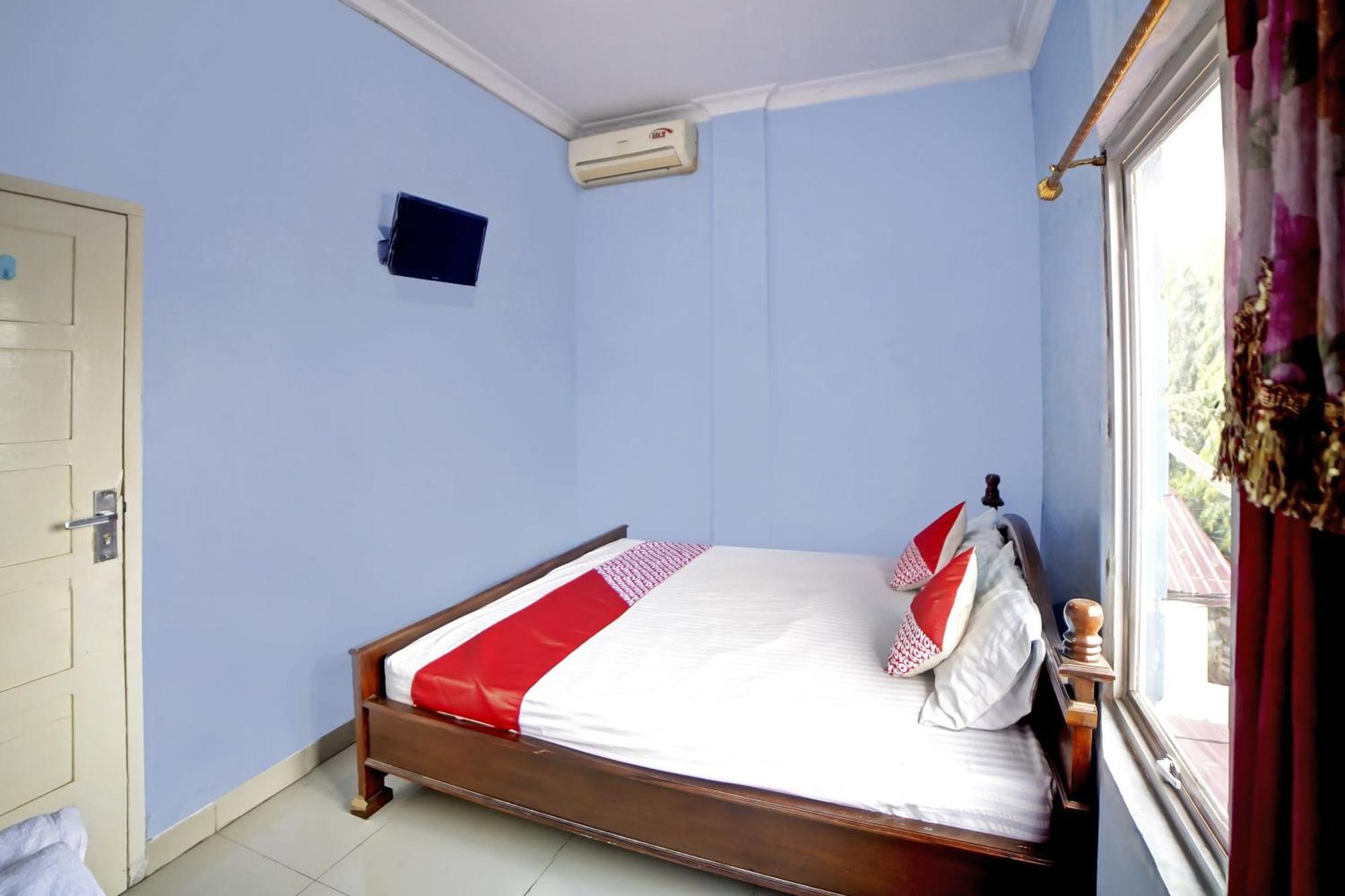 Oyo 90922 Gurusinga Guesthouse Medan Exterior foto